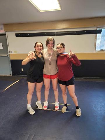 Lilli, Riley and Amyna Denton are training for competition in North Henderson.