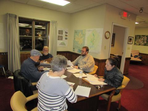 Mayor Joe Slaton and council members Harry Baughn, Austin Hedden and Lauren Tiger and Town Clerk/Finance Officer Suzanne Hedden prepare for Monday’s meeting.