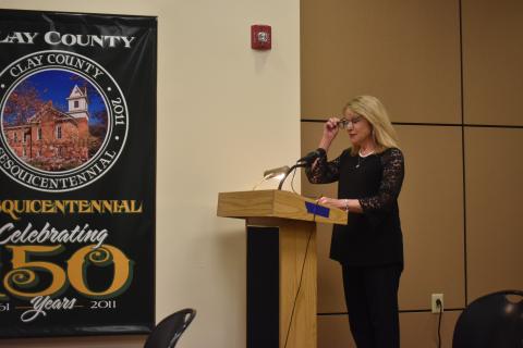 Becky Long • Clay County Progress Clay County Manager Debbie Mauney reads three resolutions during the Thursday, Feb. 2 commission meeting. The resolutions passed unanimously and will bring about several new projects in the county including an arena for community events.