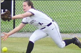 Gary Corsair • Clay County Progress Hayesville left-fielder Morgan Crawford dives for a sinking line drive in an attempt to keep Andrews from tying the score in the top of the seventh inning.