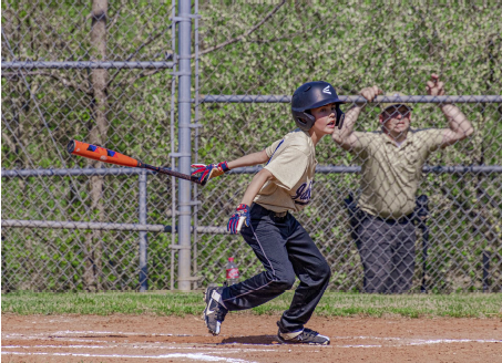 Photo•Chris Harper  Porter Hood takes his turn on batters mound controlling the bat.      		