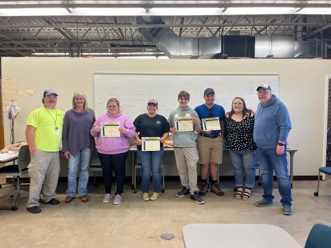 Clay County Paramedic/Peer Support Specialist Program Inaugural Class includes, from left, Ben English, instructor; Kim Fairlie, lead instructor; Kera Guffey, Abbi Sawyer, Wesley Myers, Tyler Robertson, Gerri Mitchell and Jeff Ledford, Fellowship Coordinator.