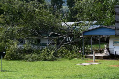 Joe Davenport • Photo A RV in Davenport Campground on U.S. 64 east suffered extensive damage from a large tree that fell during Monday's heavy winds. Fallen trees in the area also resulted in major power outages.