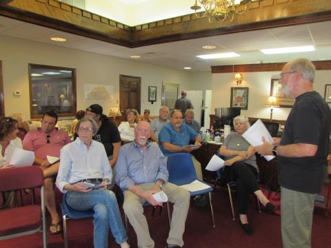 Lorraine Bennett • Clay County Progress Hayesville Mayor Joe Slaton, standing, addresses the crowd at Monday’s Town Council meeting.