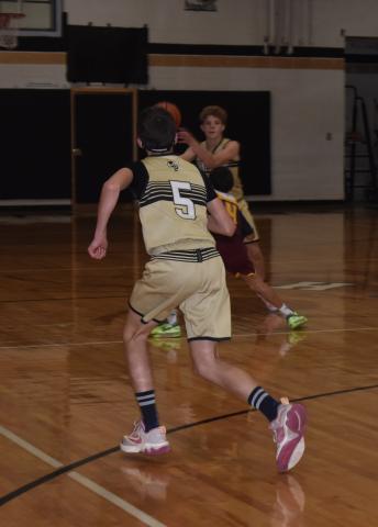 Eli Cheeks looks for a pass from Kabe Shaheen.