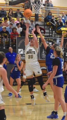 Gary Corsair • Clay County Progress Hayesville center Mallory Peck, No. 35, powers in a bucket against Hiwassee Dam.