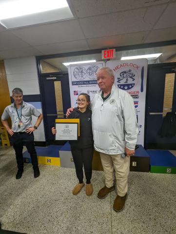 Lilliani Denton receives award from Rex Wells.