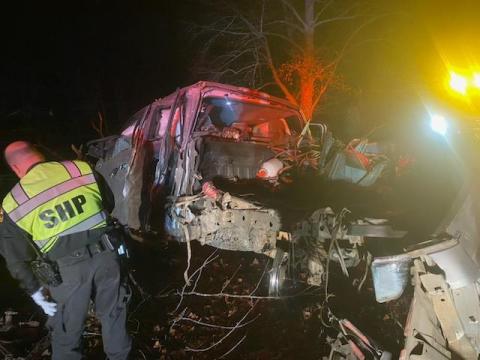 N.C. Trooper Robertson investigates the mangled remains of a 2019 Ford F150 after it crashed Monday on Cherry Road.