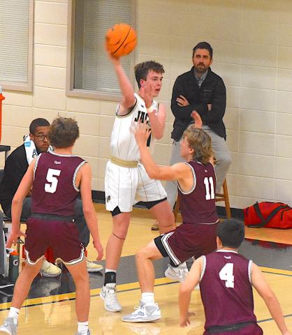 Gary Corsair • Clay County Progress Hayesville's Luke Lee, No. 4, whips a pass inside.