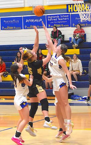 Gary Corsair • Clay County Progress Hayesville center Mallory Peck, No. 35, spins to the basket.