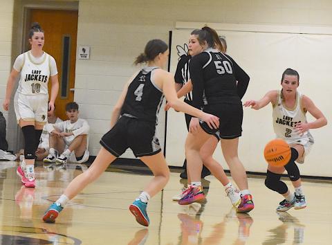 Gary Corsair • Clay County Progress Hayesville standout Ava Shook, No. 2, draws a bead on a loose ball at Robbinsville.