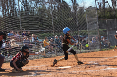 Brooke Reynolds • Clay County Progress Lucy Trout makes solid contact with the ball against Swain