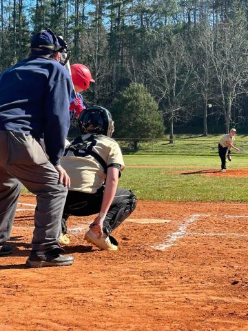Photo by Ryan Hood Matthew Peck on the mound pitches to his catcher, Camden Taylor.