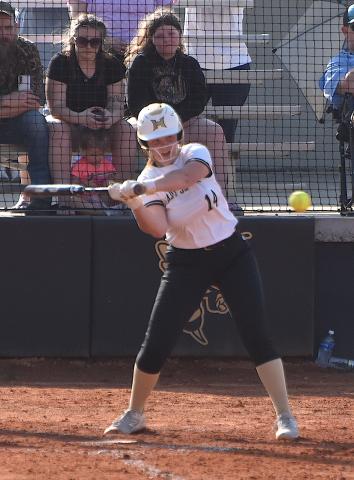 Gary Corsair • Clay County Progress Hayesville's Mallory Peck, No. 14, whacks a pitch during the Yellow Jackets' rematch with Murphy last week.