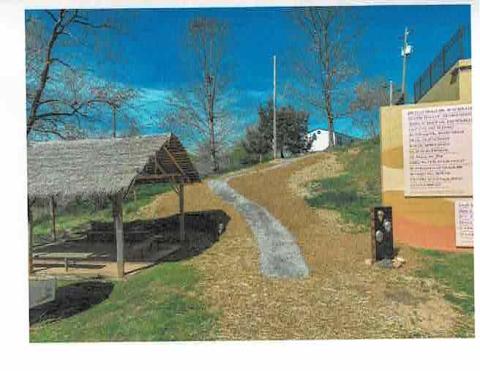 Photo by Ron Wallace The Hayesville Town Council viewed photographs of the walking trails from Cherokee Village  up to the Old Jail Museum.