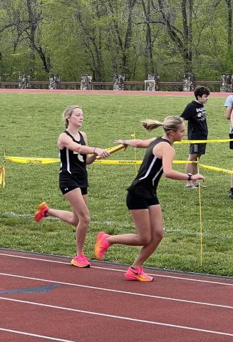 Raelynn Wood and Sidney Greenstone come in first place in the 4x800.