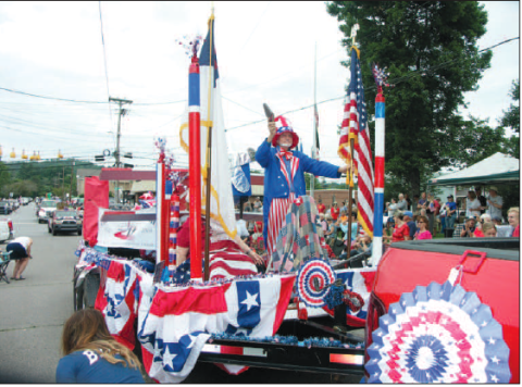 First Freewill Baptist Church and Carolina Christian Academy show off their patriotism with a beautiful red, white and blue float complete with Uncle Sam during last years Fourth of July Parade on the Hayesville town square.