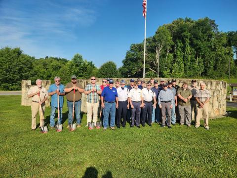 Photo • Betty Bradley Clay County Commissioners join with veterans to break ground on a Veterans Park which is slated for the first phase of opening in November of this year. Among those participating in the ceremony are, from left, Commissioners’ Clay Logan, Dwight Penland, Randy Nichols, Rob Peck and Scotty Penland along with the show of support from local veterans.