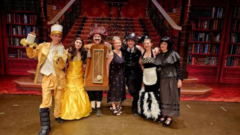 Peacock Performing Arts production of “Beauty and the Beast’s Secret Garden” are, from left, Lumiere - Lincoln Carpenter; Belle - Katelyn Elver; clock - Lucas Craddack; director Robbie Dernehl; sheriff - Hayden Stancil; Dusty - Ryleigh Elver and governess Emma Elmore.