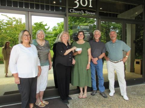 Historic Hayesville Inc. Board member Mil Puglisi and Friends of Historic Hayesville volunteer Paula Walters joined HHI Board member Marie Thompson for their presentation of $10,000 to Peacock Board member Virginia Mattox, Contractor Steven Ethridge and Peacock Board member Steve Massell to support renovation of the theater’s restrooms.