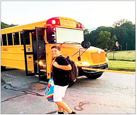 Gracie Taylor • Clay County Progress Noah Swope is all smiles after fi nishing his fi rst day in the sixth grade and marking a new beginning at Hayesville Middle School from elementary. Swope was among more than 1,300 students to return to the classroom on Monday.
