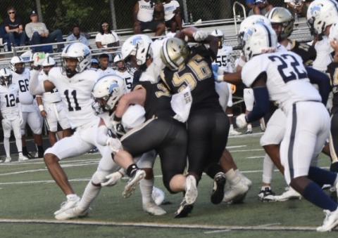 Leeanna Alberta • Clay County Progress Dawson Devane No. 32 and Will Brown No. 56 take down an Asheville player.