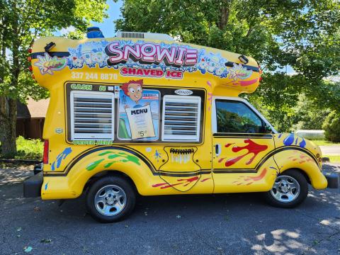Photo submitted A Back-to-School Bash will be held at Hinton Center's Moore Hall in Hayesville from 1-5 p.m. Tuesday, Aug. 20. Snowie the snow cone truck arrived right on time to last year's event at Hinton and will return again this year so attendees of all ages may receive a free snow cone. There will also be 200 free backpacks for kids and additional school supplies while supplies last.