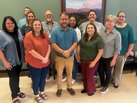 Photo submitted by Clay DSS September is Child Welfare Workforce Development Month.  Clay County DSS staff are, from left front, Kim Spurling, Courtney Robertson, Todd Goins, Kayla Nelson and Ginny Lacek; back, James Chandler, Nicole Byrne, Rex Ledford, Jeryl Waddy, Chelsea Padilla-McCabe,and Haven Phillips.