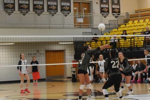 Leeanna Alberta • Clay County Progress Ava Shook, No.10, gets in a good hit with the back up from Bryleigh Krieger, No. 22, and Mallory Peck, No. 15.