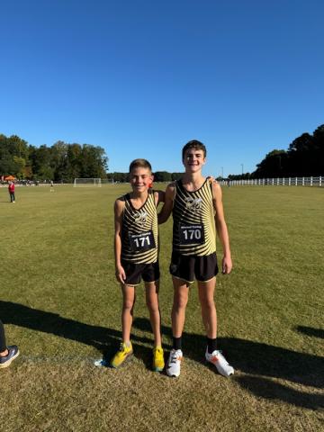 Porter Hood and Eli Cheeks are standouts at the N.C. Runners Middle School XC Festival.