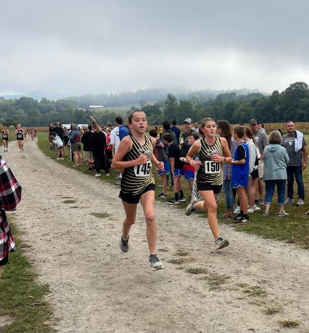 Leah Black, sixth grade, and Alaina Greenstone, seventh grade, finish fifth out of eight teams.