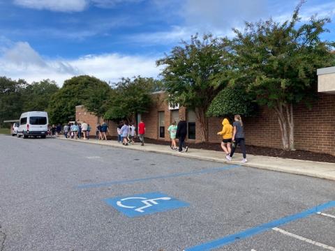 Marcia Barnes • Clay County Progress Hayesville students on the campus Tuesday morning. Bus transportation and classes resumed Monday, Sept. 30.