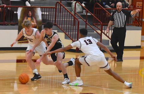 Gary Corsair • Clay County Progress Slade Crouch slices through Swain's defenders during the 2023 Smoky Mountain Conference Tournament. Crouch will quarterback the Hayesville offense in the Yellow Jackets season-opener at Towns County on Friday.