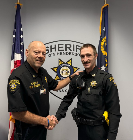 Photo • Facebook Towns County Sheriff Ken Henderson welcoming Deputy Austin Bradburn, a Blairsville resident, to the agency in October.