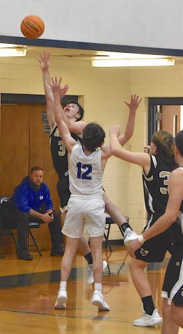 Gary Corsair • Clay County Progress Slade Crouch, No. 3, gets downhill for 2 Hayesville points at Hiwassee Dam.