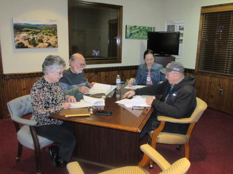 Lorraine Bennett • Clay County Progress Members of the Hayesville Town Council preparing for Monday evening’s meeting are, from left, Town Clerk/Finance Officer Suzanne Hedden, Mayor Joe Slaton, Councilwoman Lauren Tiger and Councilman Harry Baughn. Councilwoman Benita England was absent.