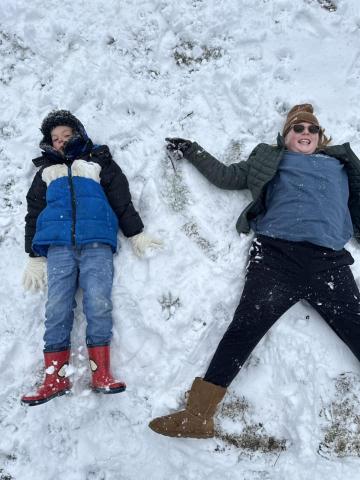 Blayne Mullins and Claire Kimsey don’t seem to mind the chill as they stretch to make their best snow angels. See more submitted snow photos from Facebook