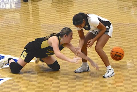 Gary Corsair • Clay County Progress Briley Clampitt dives to the ball in an attempt to regain possession for Hayesville against Coosa.