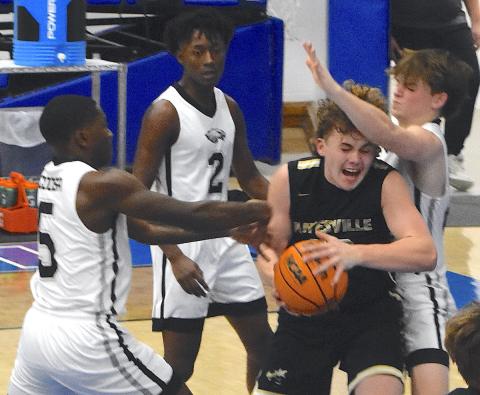 Gary Corsair • Clay County Progress Hayesville big man Jackson Sellers, No. 33, muscles his way to the basket against Coosa.