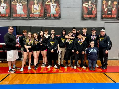 The Hayesville High School wrestling team consist of, front from left, Coach Colby White, Amelia Manning, Fara Ammons, Pyper Leford, Jack Eskildsen, Kaden Harbuck, Parker Hughes, Edwin Nava and Manager Norashae Patterson; back, Silas Lovingood, Logan Querns, Robert Manning, Rayland Martinez, Jameson Dawson, Andrew Reynolds and Coach Andrew Reynolds. 