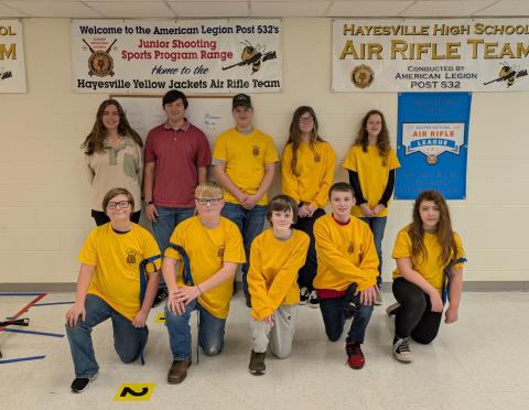 The Hayesville Yellow Jacket Air Rifle Team members are, from front left, Jaxin Eubanks, Rockie Brown, Masyn Parrinello, Nathan Fisher and Wednesday Johnson; back, Maggie McClure, Will Jennings, Devin Ramey, Leyah Parrinello and Zoe Angelopulos. Team members not shown are Hunter Chastain, Lucas Brown, Ryder Schaffer and Ragen Schaffer.