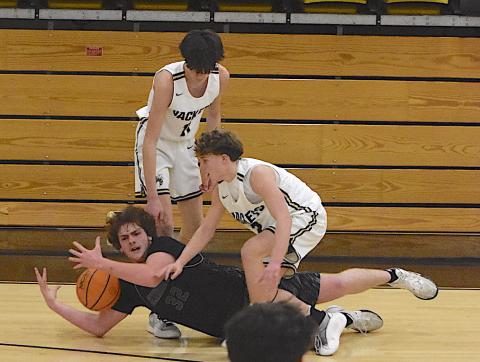 Gary Corsair • Clay County Progress Hayesville’s Kabe Shaheen and Damien Soto attempt to wrestle the ball away from Robbinsville.