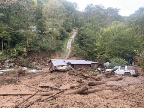 Photo contributed from family fund-raiser page What remains of grandpa Billy Joe and grandma Dora's home in Avery County, N.C. The couple lived there for decades and raised eight children and many other family members felt it was a safe refuge. Fourteen family members sought safety there the day of Helene, but only 12 escaped before the mudslide destroyed the small home.