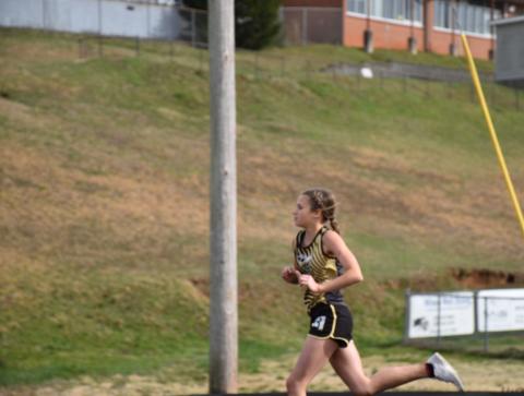 Norashae Patterson • Clay County Progress Makenna Moss helps her team win first in the 4X800 and 4X400 relays.