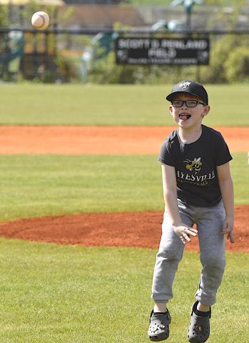 Six-year-old Cooper Godfrey, son of Jamie and Melissa Godfrey, throws out the first pitch prior to Hayesville’s 3-0 victory over Mitchell in the first round of the North Carolina High School Athletic Association 1-A playoffs Tuesday at Scott D. Penland Baseball Field. The No. 8 seed Yellow Jackets meet No. 24 seed Mountain Island Charter School in the second round on Friday.