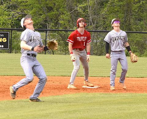 Gary Corsair • Clay County Progress All eyes are on the prize as Hayesville shortstop Tate Roberts camps under a high pop-up that also caught the attention of Michael Mauney.