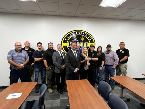 Deby Jo Ferguson • Clay County Progress Congressman Chuck Edwards, center, recognizes emergency workers for their service, from left, Daniel McNabb-Paramedic; CCSO Investigator Brandon Coker; Benton Logan, CCSO; Lt. Tyler Faggard; Sheriff Mark Buchanan; Edwards; Clay County Manager Debbie Mauney; Emergency Management Coordinator Jeff Ledford; CCSO Sgt. Ethan Henderson; Clay County Dispatcher Leann Moore; Paramedic Brandon Bailey and CCSO Chief Deputy Joe Wood.