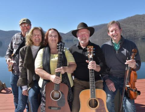 Sweet ‘N Sourwood Honey band features a lineup of five musicians, from left, Shell Traver, Margie Watkins, Shelly Arvidson, Dan Watkins and Steve Vick. They will be performing from 6:30-8 p.m. Saturday, Aug. 23 on the Hiawassee Square.