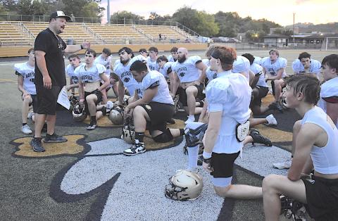 Gary Corsair • Clay County Progress Hayesville head football coach Chad McClure stresses the importance of dedication following Friday's football practice.