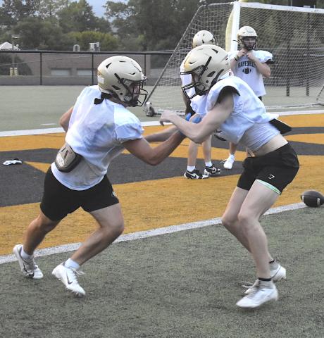 Gary Corsair • Clay County Progress Logan Querns, right, tries to contain Tre Graves during a drill as the varsity Yellow Jackets prepare for Friday's regular season opener at Asheville School.